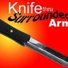 Knive through arm surrounded