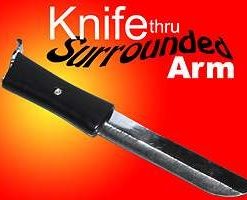 Knive through arm surrounded